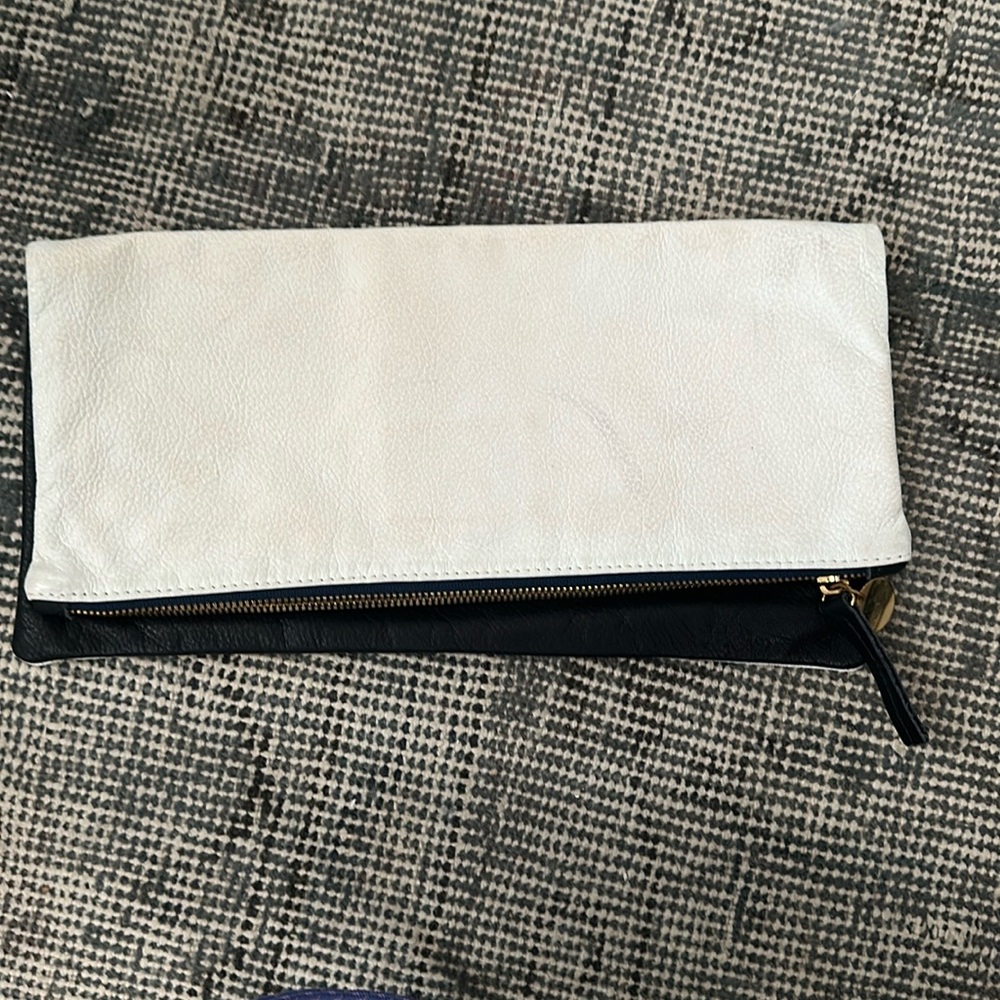 Clare V. Bicolor fold over black & white clutch
